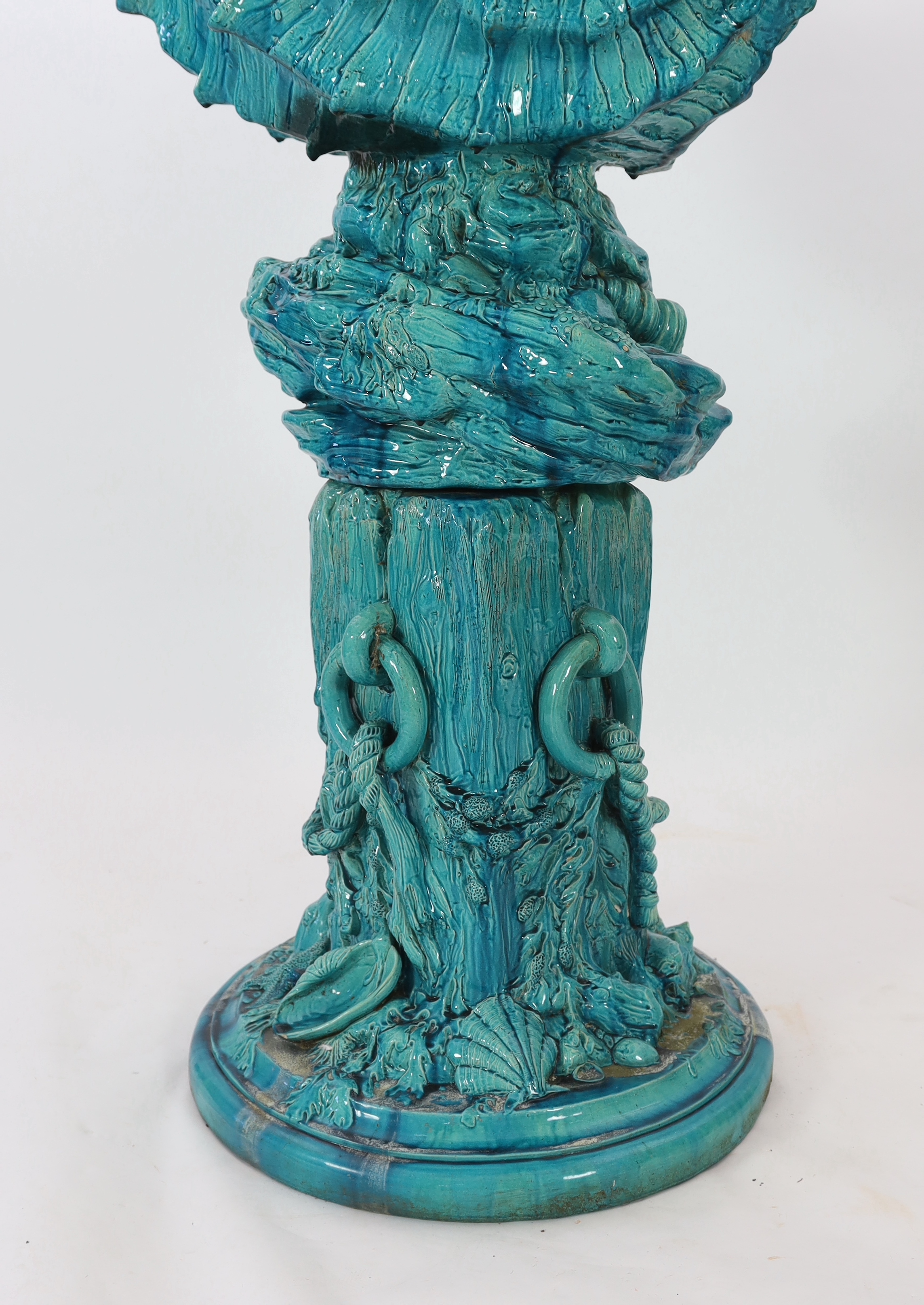 An impressive Burmantofts turquoise glazed faience ‘giant shell’ jardiniere and stand, c.1900, small glaze losses and some weathering